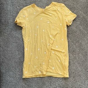 Yellow w/ white flower shirt